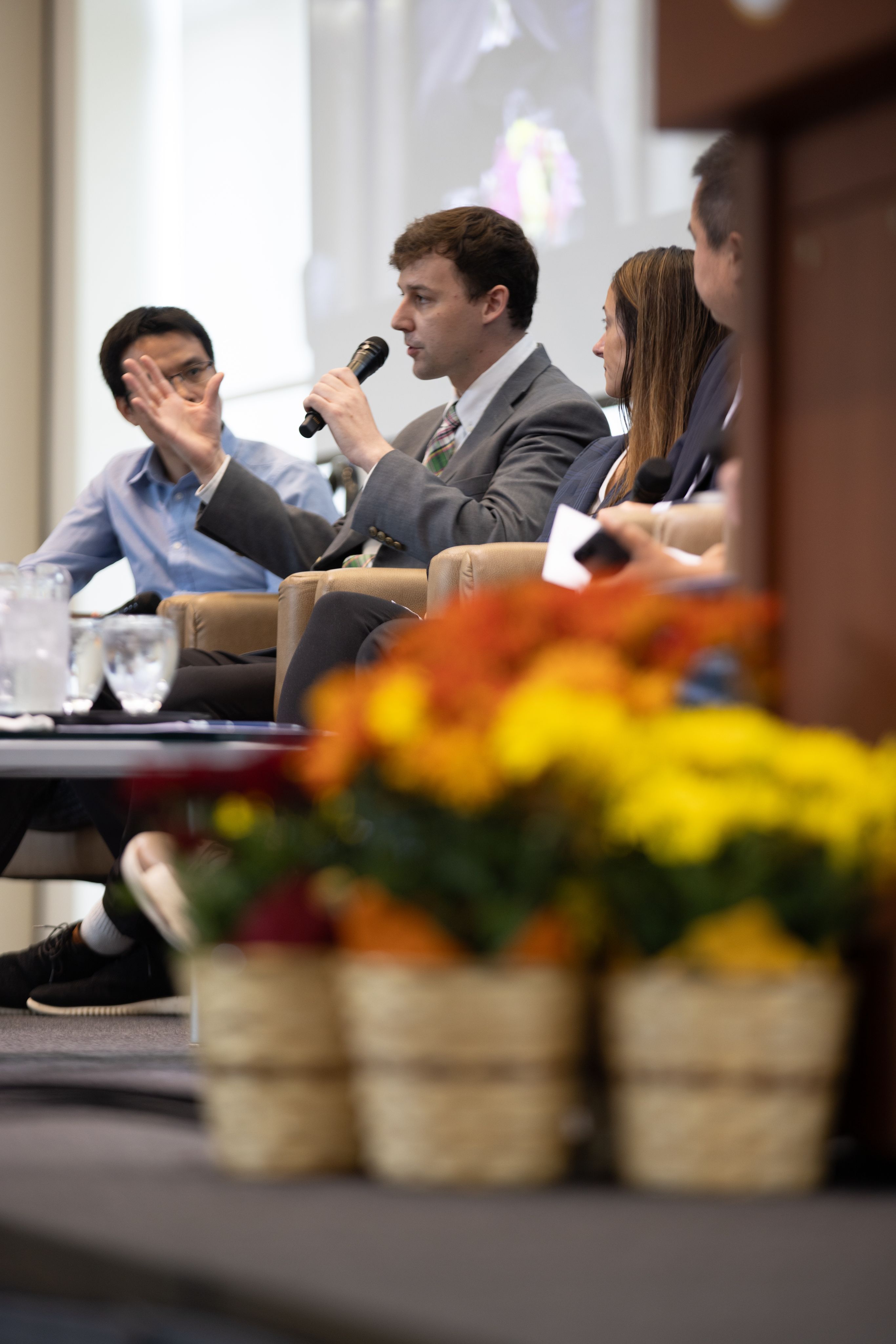 Cody Turner speaking on an academic panel